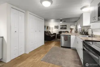 A view of the kitchen back toward the living room and hallway.
