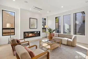 Light filled great room with cozy fireplace