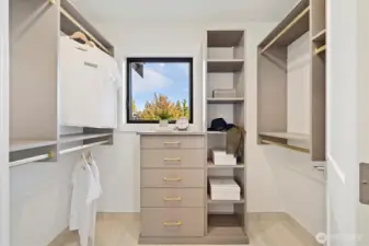 Primary walk-in closet with built-in closet organizers