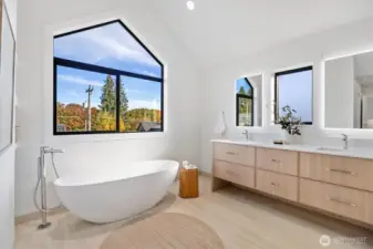 Relax in the spa-like primary bath
