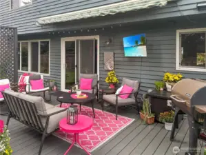 Larger entertaining deck with retractable awning.