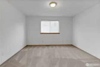 Primary Bedroom view from Entry Door in front Hallway off Living Room