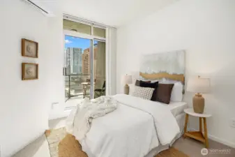 2nd bedroom with private access to the sunny balcony.