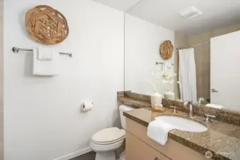 Full guest bath off the hallway.