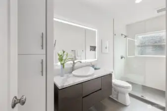 Updated bathroom with large walk-in shower.