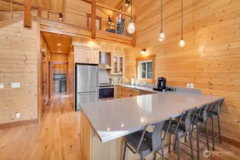 Stainless Steel appliances, custom handmade cabinets, and quartz countertops. This kitchen is spectacular.