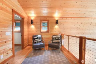 The primary bedroom w en suite is in the lofted 2nd floor. It features a vaulted ceilings, large sitting area, and a 3/4 bath.