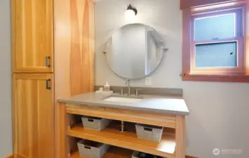The primary bedroom w en suite is in the lofted 2nd floor. It features a vaulted ceilings, large sitting area, and a 3/4 bath.