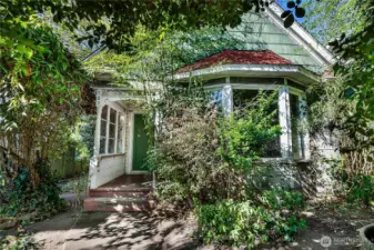 Lots of options on this lot! Restore the beautiful Victorian era home or scrape the lot to take advantage of new City of Seattle zoning allowing anywhere from 3 - 6 units (over 4 units has additional requirements).