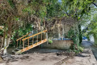 Long driveway offers access from street to detached garage + storage shed and lots of off-street tandem parking.