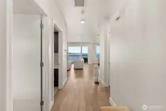 Wide-plank wooden floors lead your directly to your spectacular view.