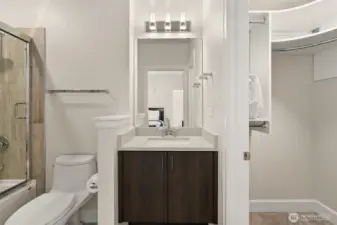 This photo puts a whole new meaning to 'elongated' toilets!  But it does let you see the layout and the closet of the bathroom off the 2nd bedroom.