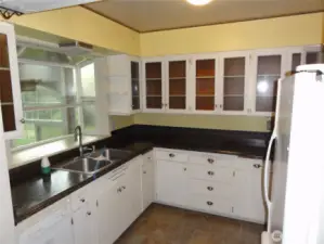 Kitchen has plenty of counter space and cabinets.