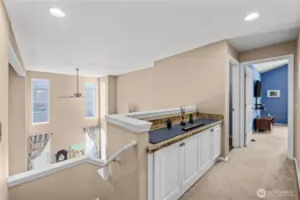 Lots of natural light fills the upstairs- nook with extra storage!