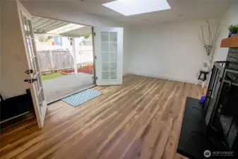 Greatroom opens up with frenchdoors to your outdoor patio space