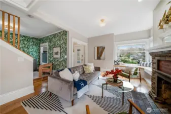 You're met with soaring ceilings and tons of natural light on the main level opening up