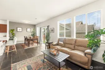Wrapping around to the dining area, flanked by wonderful windows.