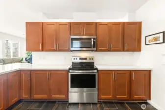 Hardwood cabinets for days.