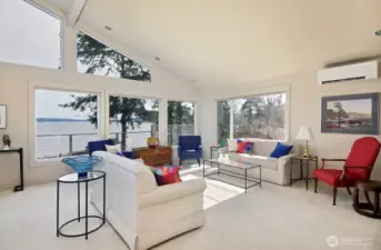 Floor to ceiling windows to let in the light and expand the views.  A heat pump with A/C to keep you cool on warmer days if needed