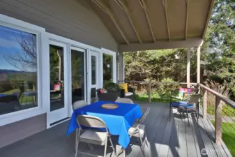 Covered deck to enjoy the outdoors even on rainy days.