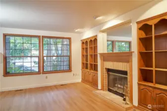 Living room fireplace and built in cabinets.