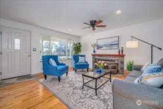 Enter the home to hardwood floors and lots of natural light. Wood burning fireplace has newly rebuilt chimney!