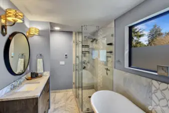 Primary bathroom has 2 vanities, massive 3 heads shower and heated floor plus (next picture)