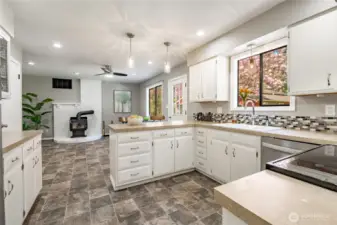 Kitchen / Family Room with cozy wood FP
