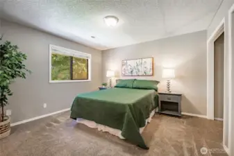 Primary Bedroom with double closets and a 3/4 bath
