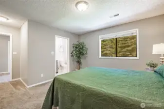Primary bedroom and bathroom