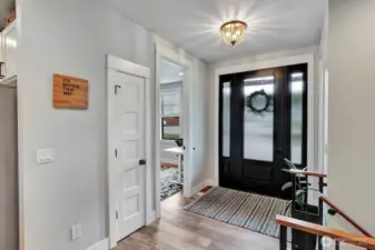 Front entry opens to a spacious open floor concept.