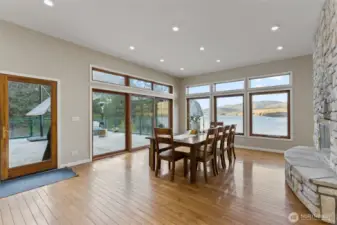 Dining with triple doors to patio