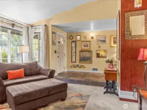 In the living room looking towards the front door.