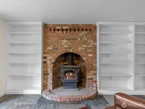 The Rec Room built-in bookshelves and woodstove.