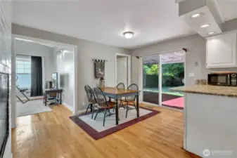 Dininng room and access to 2 bedrooms and has the great room feel.  Sliders to the large covered patio
