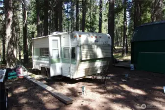 old camp trailer included