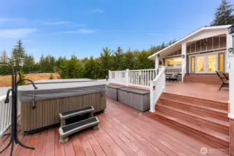 The third level of the deck is larger than most and is the perfect place to unwind and relax in your Jacuzzi tub, also included with the home.