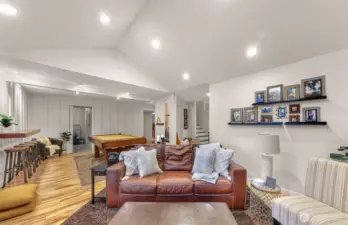 And the second indoor living space is more like a stylish lodge than a house. This room is just begging for you to enjoy it. The pool table & equipment will stay with the home as does the large TV that fits just perfectly over the fireplace.