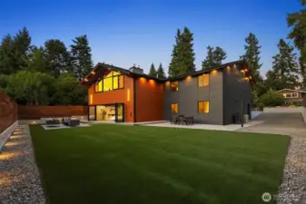 Garage includes EV charger, laundry with sink & cabinetry, and LiftMaster myQ WiFi opener for remote access.