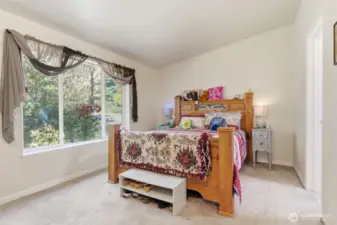 Primary bedroom with attached bathroom