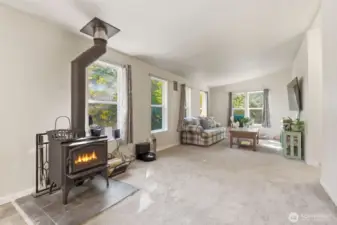 Wood burning fireplace in the large living area