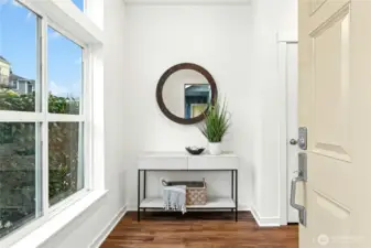 Entry with high ceilings and an abundance of natural light.