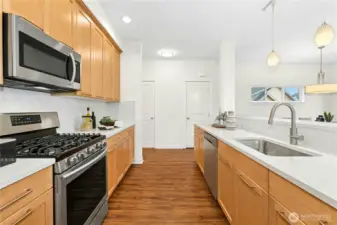 Gas cooking and stainless steel appliances.