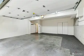 Oversized 2 car garage with large closet, upgraded tankless water heater, and plenty of space for home gym or storage racks!