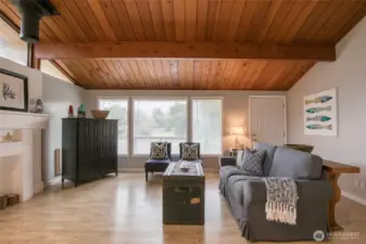 Vaulted ceilings and a fresh coat of paint accentuate the beauty of this room