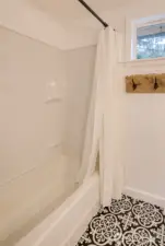 New bathtub surround, faucets and rain shower head