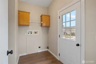Laundry room with access to the back yard