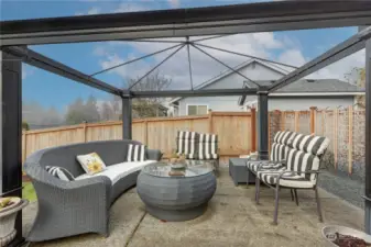 A close up photo of the seating area under the gazebo.