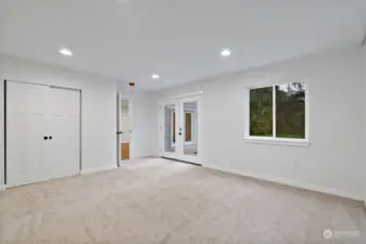 The downstairs 3rd bedroom is massive with French doors to the outside patio. Very nice.