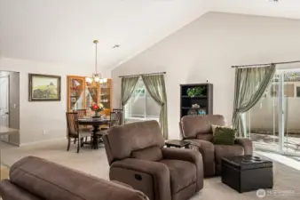 Living room with patio door to backyard